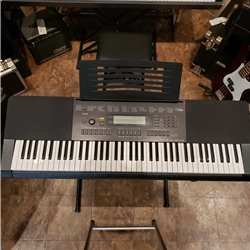 Casio WK-245 76-Key Keyboard with Power Supply, Detachable Stand, and Manual